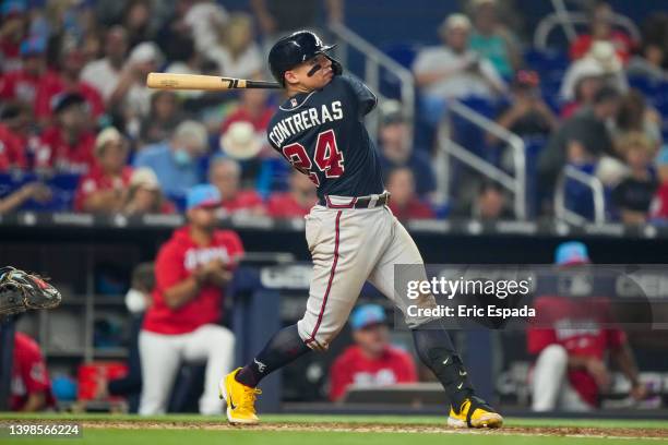 William Contreras of the Atlanta Braves hits a home run during the seventh inning against the Miami Marlins at loanDepot park on May 21, 2022 in...