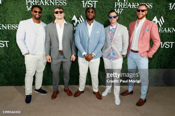 Jonathan Allen, Cole Holcomb, Daniel Wise, Tress Way and Carson Wentz attends Preakness 147 hosted by 1/ST at Pimlico Race Course on May 21, 2022 in...
