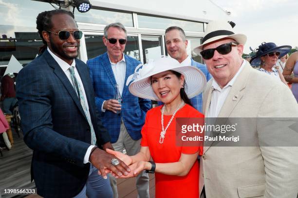 Josh Bynes, J.R. Reith, Yumi Hogan, John Harbaugh and Governor Larry Hogan attend Preakness 147 in the 1/ST Chalet hosted by 1/ST at Pimlico Race...
