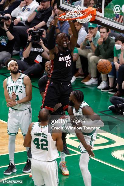 Bam Adebayo of the Miami Heat dunks the ball in the fourth quarter against the Boston Celtics in Game Three of the 2022 NBA Playoffs Eastern...