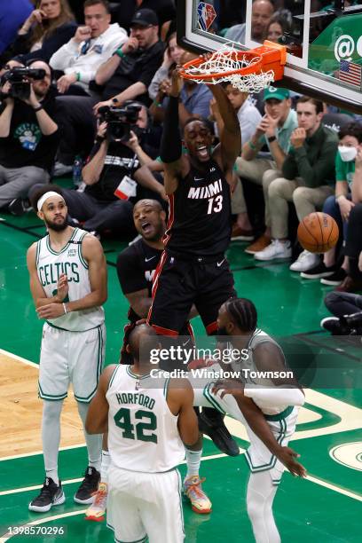 Bam Adebayo of the Miami Heat dunks the ball in the fourth quarter against the Boston Celtics in Game Three of the 2022 NBA Playoffs Eastern...