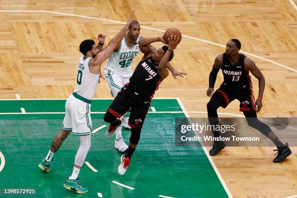 Kyle Lowry of the Miami Heat looks to shoot against Jayson Tatum of the Boston Celtics in the second quarter in Game Three of the 2022 NBA Playoffs...