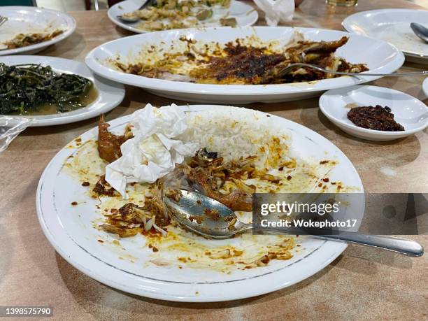 dirty plates after dinner in restaurant. - dirty plate stock pictures, royalty-free photos & images