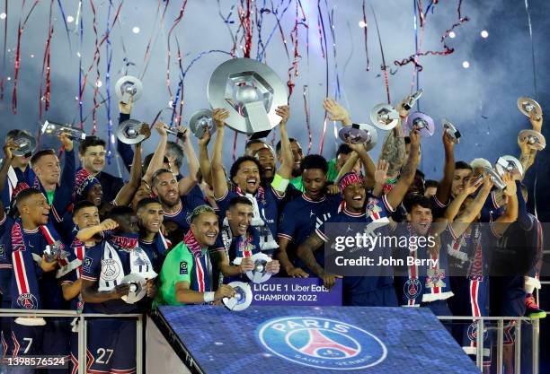 Captain of PSG Marquinhos and teammates celebrate during the French Ligue 1 trophy presentation following the Ligue 1 Uber Eats match between Paris...