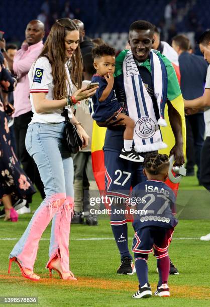 Idrissa Gueye Gana of PSG, his wife Pauline Gueye and their sons Isaac Gueye; Ismael Gueye following the French Ligue 1 trophy presentation after the...
