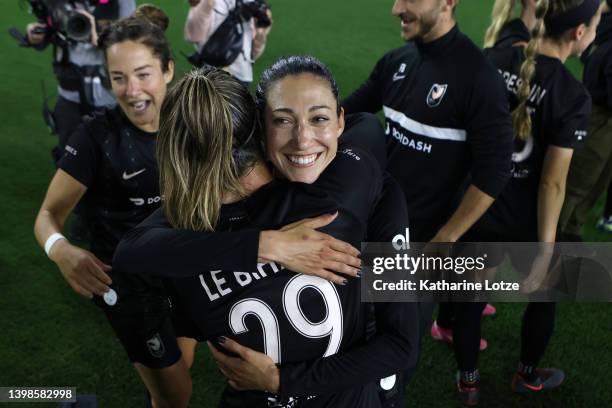 Clarisse Le Bihan of Angel City FC and Christen Press of Angel City FC hug following a game against the Kansas City Current at Banc of California...