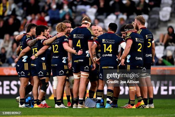 The Highlanders regroup during the round 14 Super Rugby Pacific match between the Highlanders and the NSW Waratahs at Forsyth Barr Stadium on May 22,...