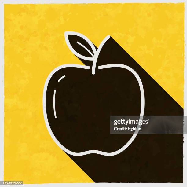 apple. icon with long shadow on textured yellow background - leaf shadow texture stock illustrations