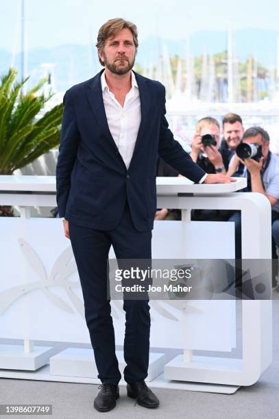 Director Ruben Ostlund attends the photocall for "Triangle Of Sadness" during the 75th annual Cannes film festival at Palais des Festivals on May 22,...