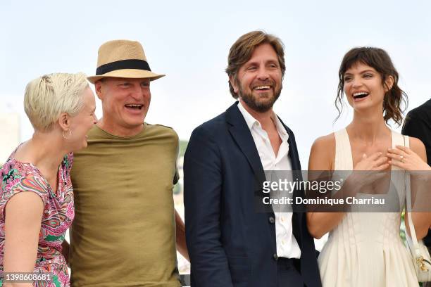 Vicki Berlin, Woody Harrelson, Director Ruben Ostlund, and Charlbi Dean Kriek attend the photocall for "Triangle Of Sadness" during the 75th annual...