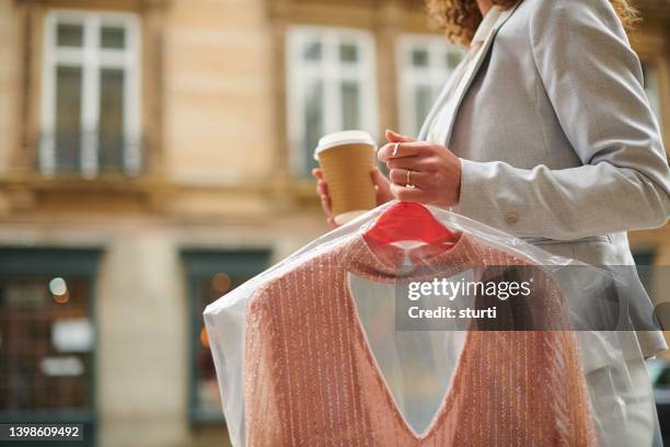 picked up the dry cleaning - dry cleaning stock pictures, royalty-free photos & images