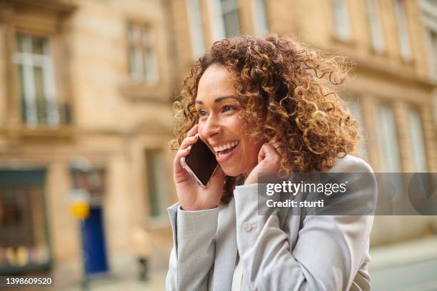 excited commuter - phone interview event stock pictures, royalty-free photos & images
