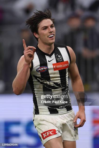 Oliver Henry of the Magpies celebrates a goal during the round 10 AFL match between the Fremantle Dockers and the Collingwood Magpies at Optus...