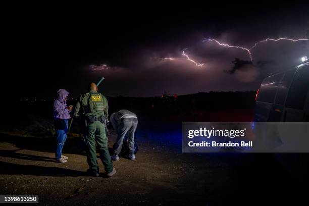 Border Patrol officer process migrants from Colombia after they crossed the Rio Grande on May 22, 2022 in Eagle Pass, Texas. Title 42, the...