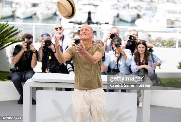 Woody Harrelson attends the photocall for "Triangle Of Sadness" during the 75th annual Cannes film festival at Palais des Festivals on May 22, 2022...