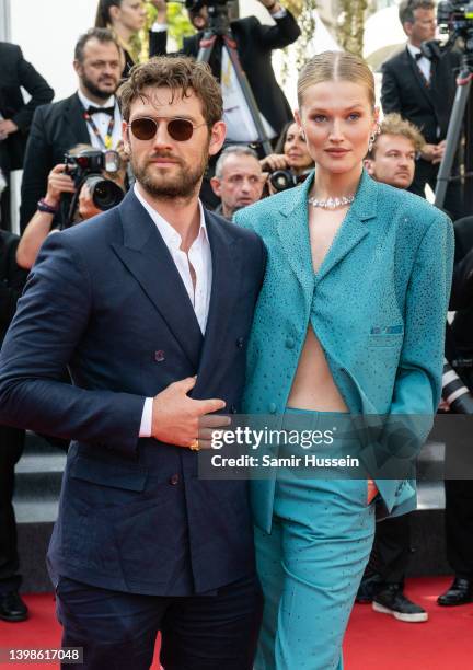 Toni Garrn and Alex Pettyfer attend the screening of "Triangle Of Sadness" during the 75th annual Cannes film festival at Palais des Festivals on May...