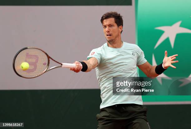 Aljaz Bedene of Slovenia plays a forehand against Christopher O'Connell of Australia during the Men's Singles First Round match on Day 1 of The 2022...