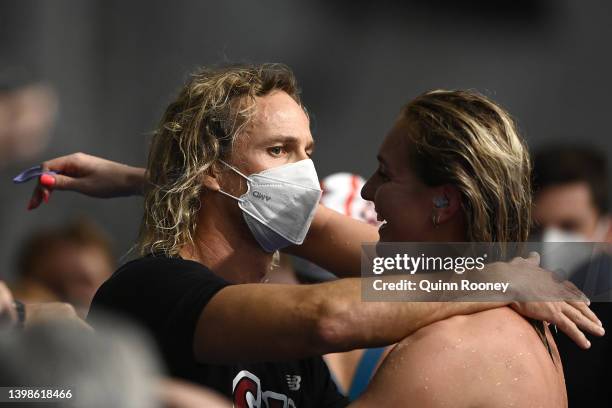 Ariarne Titmus of Australia hugs her coach Dean Boxall after breaking the world record in the Womens 400 Metre Freestyle Final during day five of the...
