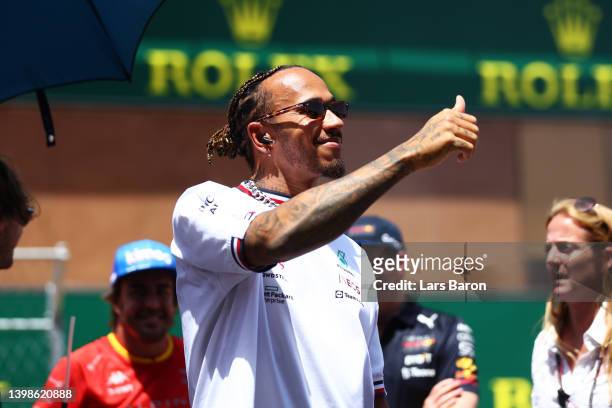 Lewis Hamilton of Great Britain and Mercedes waves to the crowd on the drivers parade prior to the F1 Grand Prix of Spain at Circuit de...