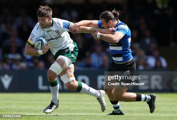 Ben Donnell of London Irish is challenged by Max Clark of Bath Rugby during the Gallagher Premiership Rugby match between Bath Rugby and London Irish...