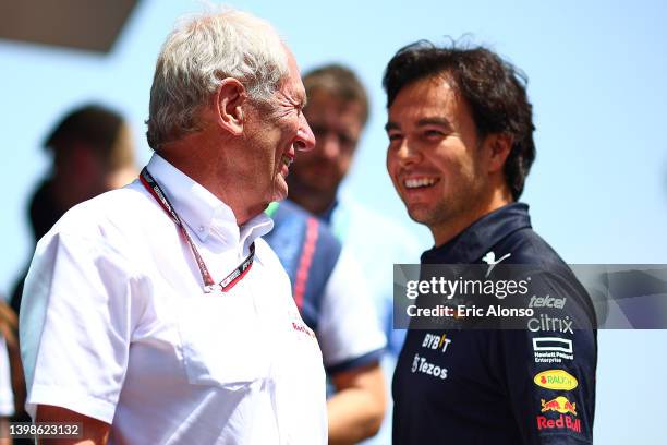 Helmut Marko of Red Bull Racing speaks with Sergio Perez of Mexico and Oracle Red Bull Racing prior to the F1 Grand Prix of Spain at Circuit de...