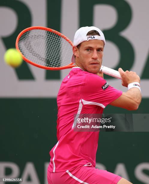 Diego Schwartzman of Argentina plays a backhand during his mens singles first round against Andrey Kuznetsov on day 1 of the 2022 French Open at...