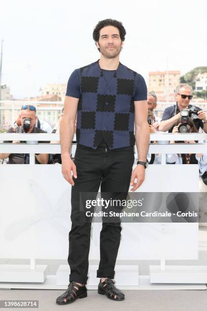 Tahar Rahim attends the photocall for "Don Juan" during the 75th annual Cannes film festival at Palais des Festivals on May 22, 2022 in Cannes,...