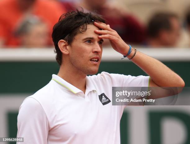 Dominic Thiem of Austria reacts during his mens singles first round against Hugo Dellien of Bolivia on day 1 of the 2022 French Open at Roland Garros...