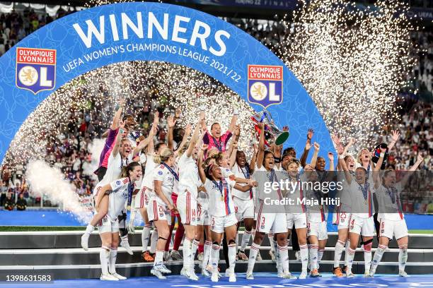 Wendie Renard of Olympique Lyonnais lifts the UEFA Women's Champions League trophy after their sides victory during the UEFA Women's Champions League...