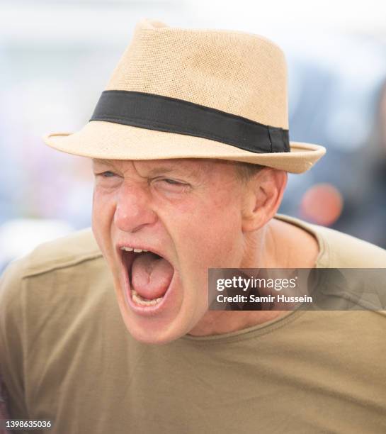 Woody Harrelson attends the photocall for "Triangle Of Sadness" during the 75th annual Cannes film festival at Palais des Festivals on May 22, 2022...