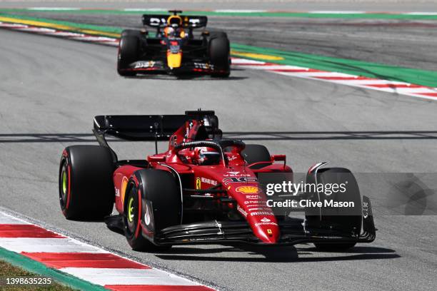 Charles Leclerc of Monaco driving the Ferrari F1-75 leads Max Verstappen of the Netherlands driving the Oracle Red Bull Racing RB18 during the F1...