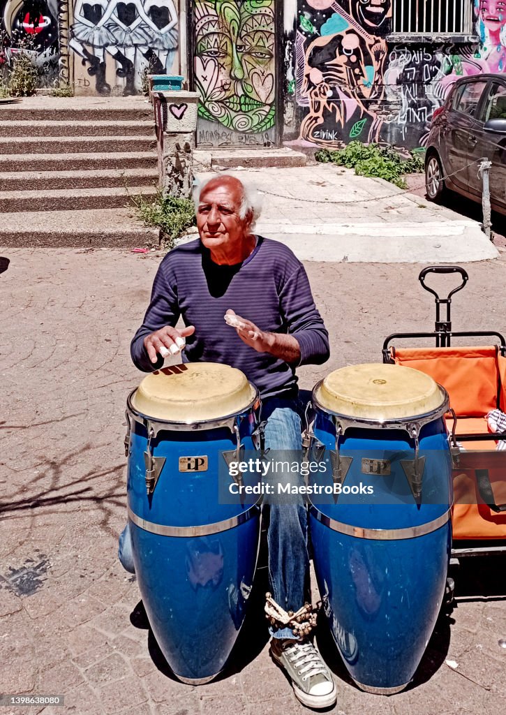 Retired man busking in Tel Aviv