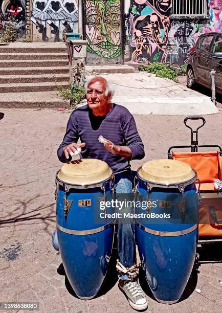 retired man busking in tel aviv - middle east cool stock pictures, royalty-free photos & images