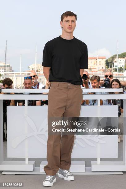 Harris Dickinson attends the photocall for "Triangle Of Sadness" during the 75th annual Cannes film festival at Palais des Festivals on May 22, 2022...