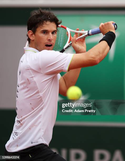Dominic Thiem of Austria plays a backhand during his mens singles first round against Hugo Dellien of Bolivia on day 1 of the 2022 French Open at...