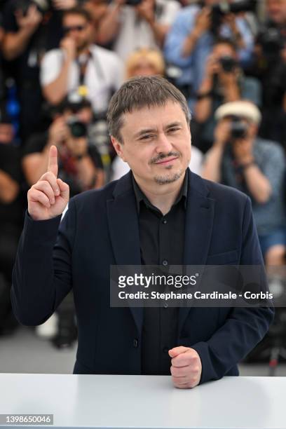 Cristian Mungiu attends the photocall for "R.M.N" during the 75th annual Cannes film festival at Palais des Festivals on May 22, 2022 in Cannes,...