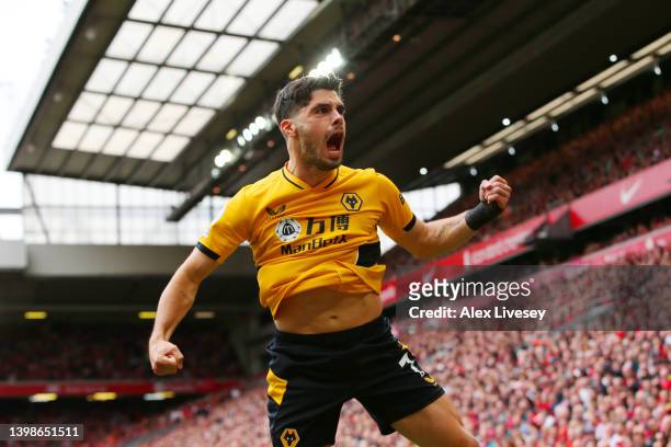 Pedro Neto of Wolverhampton Wanderers celebrates after scoring their sides first goal during the Premier League match between Liverpool and...