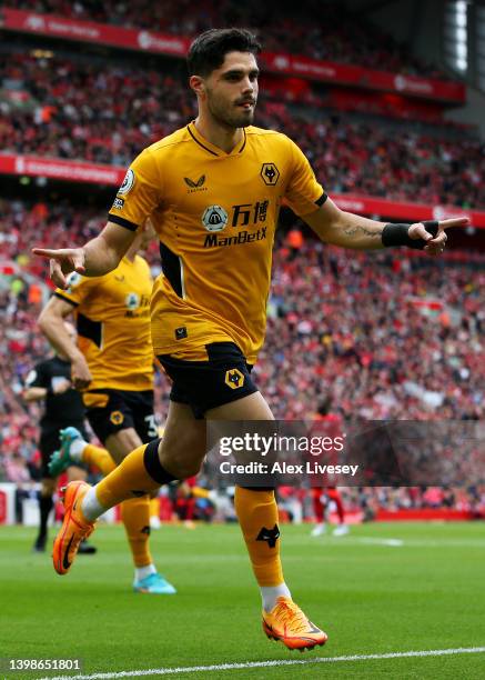 Pedro Neto of Wolverhampton Wanderers celebrates after scoring their sides first goal during the Premier League match between Liverpool and...