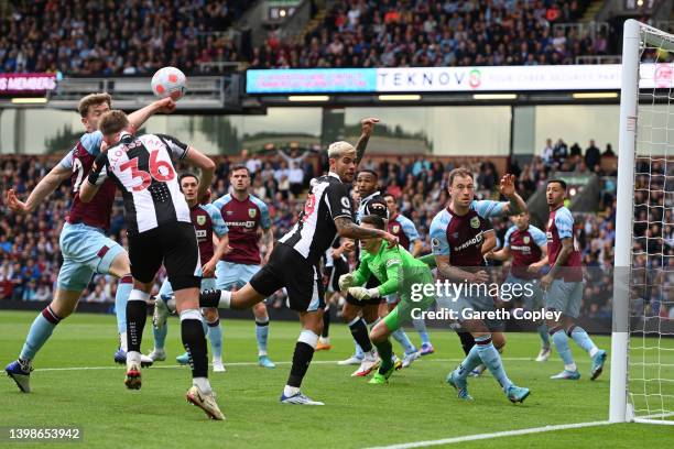 Matthew Lowton of Burnley handles the ball leading to a penalty being awarded during the Premier League match between Burnley and Newcastle United at...