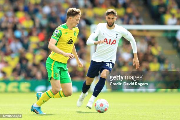 Kieran Dowell of Norwich City is closed down by Rodrigo Bentancur of Tottenham Hotspur during the Premier League match between Norwich City and...