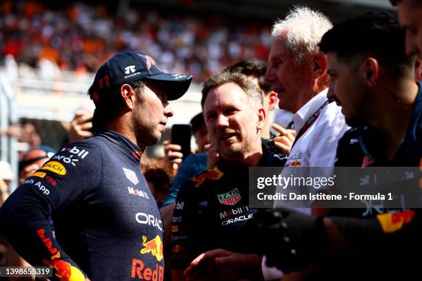 Second placed Sergio Perez of Mexico and Oracle Red Bull Racing talks with Red Bull Racing Team Principal Christian Horner and Red Bull Racing Team...