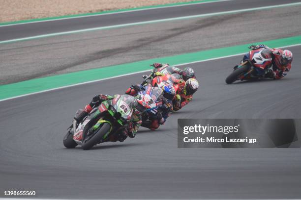 Jonathan Rea of Ireland and Kawasaki Racing Team WorldSBK leads the field during the Superbike race 2 during the FIM Superbike World Championship...