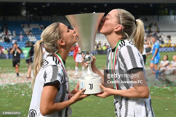 Tuija Hyyrynen and Linda Sembrant of Juventus Women celebrate the winning of the Italian Cup with the trophy after during the Women Coppa Italia...