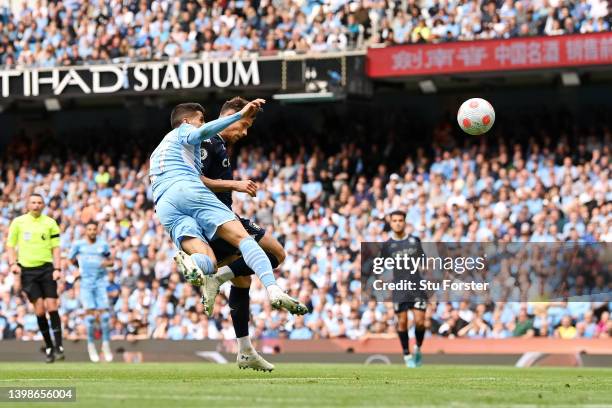 Matty Cash of Aston Villa scores their team's first goal during the Premier League match between Manchester City and Aston Villa at Etihad Stadium on...