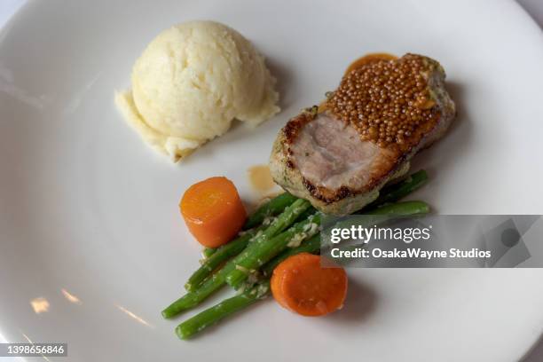steamed vegetable with slice of meat on white plate - new paltz stock pictures, royalty-free photos & images