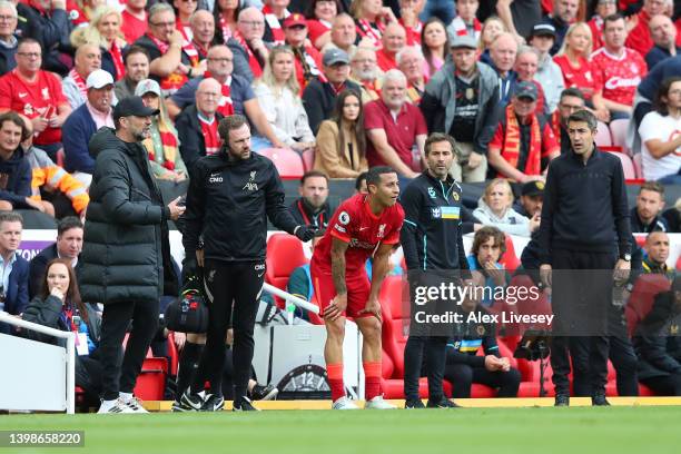 Thiago Alcantara of Liverpool leaves the pitch due to injury during the Premier League match between Liverpool and Wolverhampton Wanderers at Anfield...