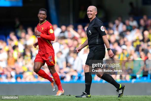 Referee Mike Dean, officiating his last game, during the Premier League match between Chelsea and Watford at Stamford Bridge on May 22, 2022 in...