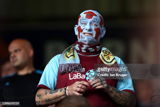 Fan looks on during the Premier League match between Burnley and Newcastle United at Turf Moor on May 22, 2022 in Burnley, England.