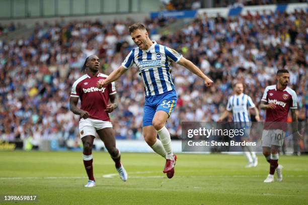 Joel Veltman of Brighton & Hove Albion celebrates after scoring their side's first goal during the Premier League match between Brighton & Hove...