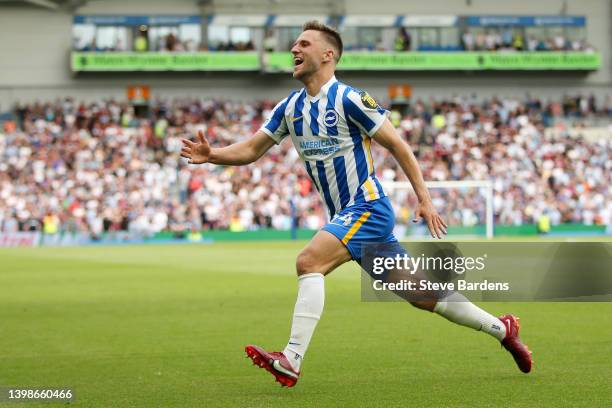 Joel Veltman of Brighton & Hove Albion celebrates after scoring their side's first goal during the Premier League match between Brighton & Hove...